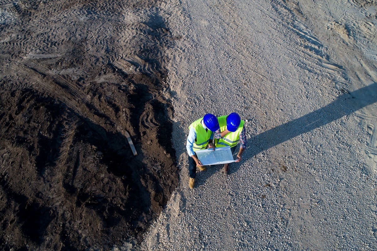 Overhead shot of jobsite meeting