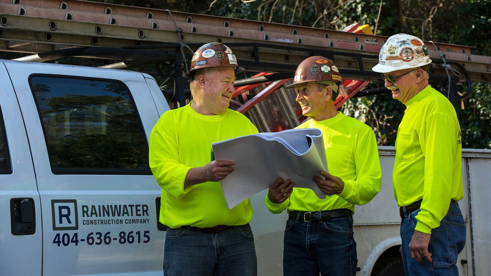 Construction team reviewing plans