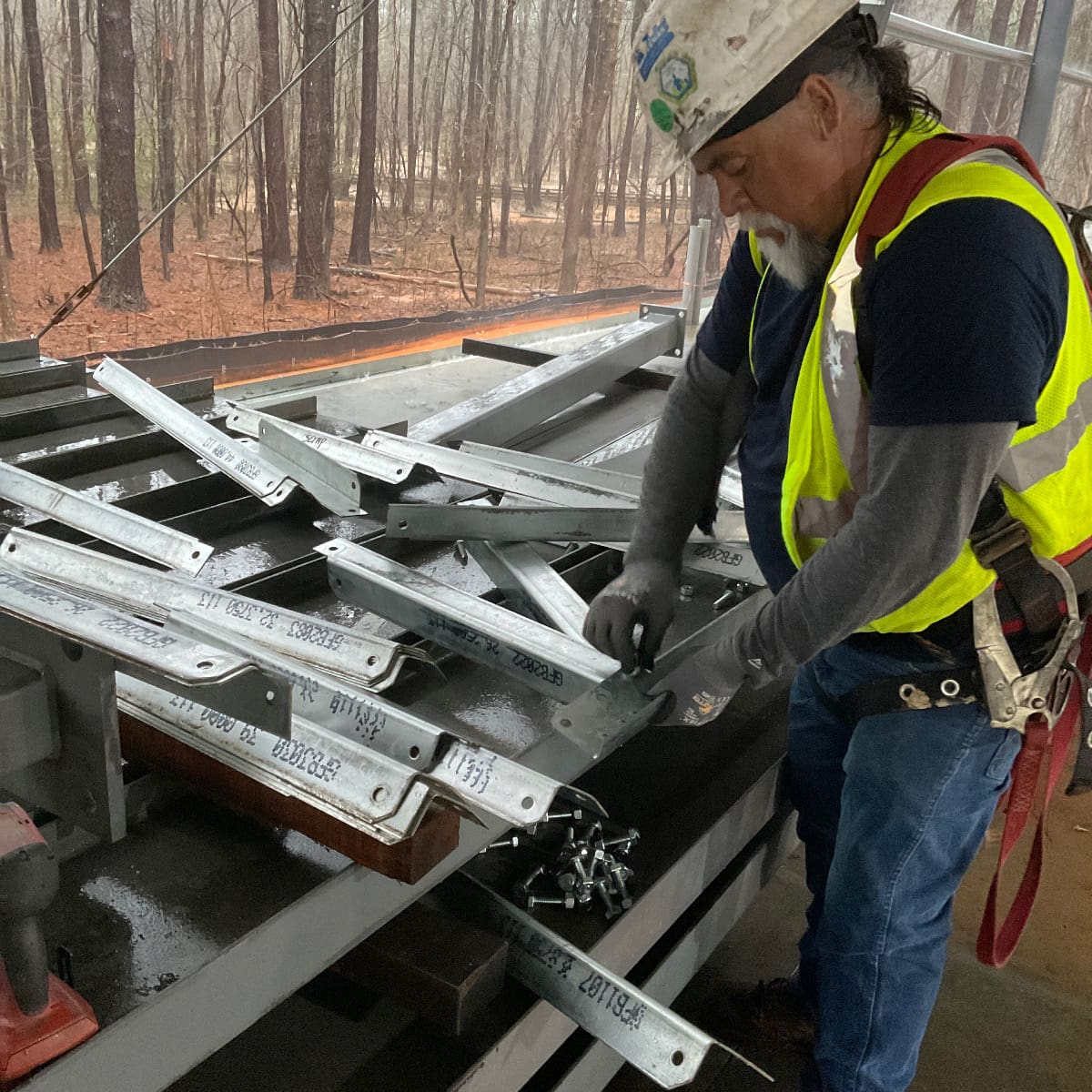 Rainwater crewmember working on site