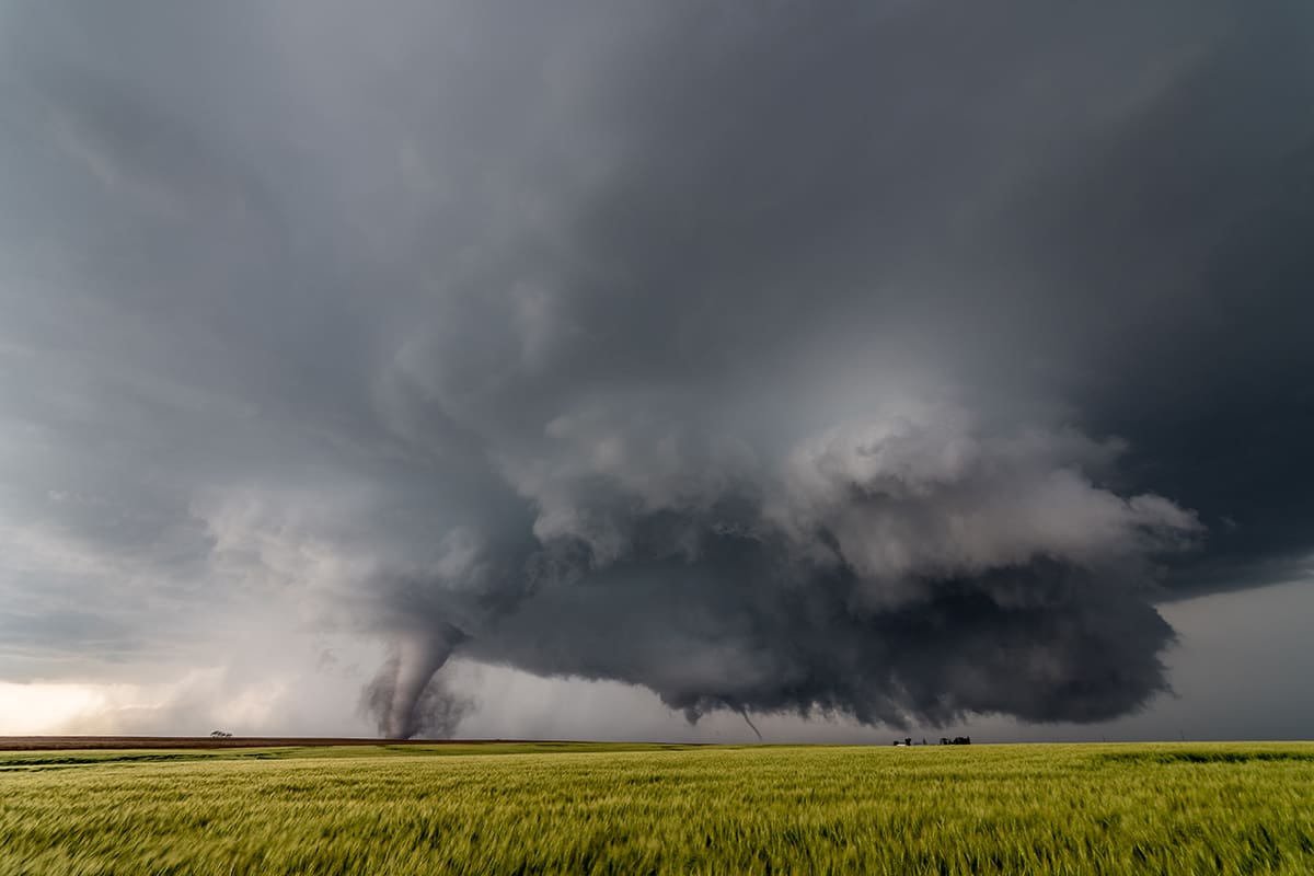 Tornado touching down in field