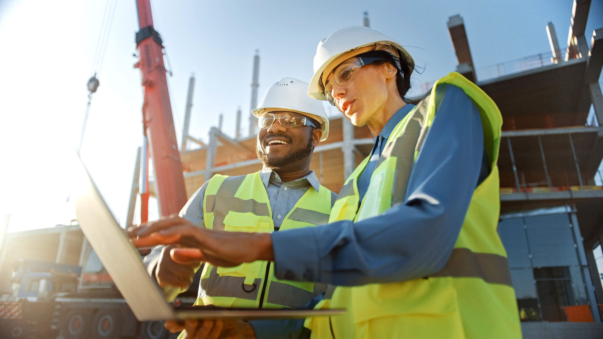 Two Specialists Inspect Commercial, Industrial Building Construc Construction Inspectors